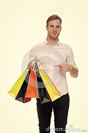 All mine. Birthday gifts arrived on time. Guy satisfied got bag gift. Man happy received package gift isolated white Stock Photo