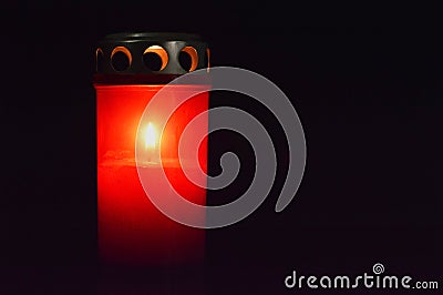 All Saints Day burning candle Stock Photo