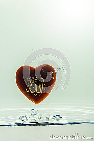 `allah` god of Islam with symbol Water splash with bubbles of air, on the white background Stock Photo