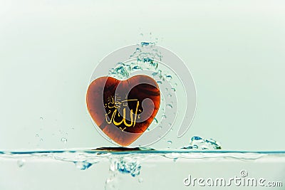 `allah` god of Islam with symbol Water splash with bubbles of air, on the white background Stock Photo