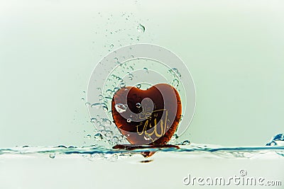 `allah` god of Islam with symbol Water splash with bubbles of air, on the white background Stock Photo