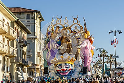 The allegorical float entitled `Abbracciami e' Carnevale` during the parade in Viareggio, Italy Editorial Stock Photo