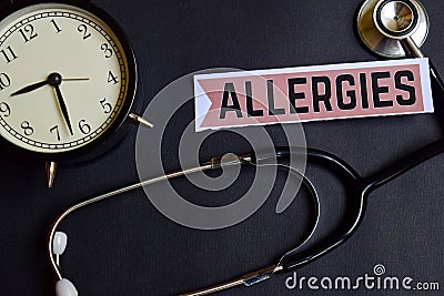 Allergies on the paper with Healthcare Concept Inspiration. alarm clock, Black stethoscope. Stock Photo