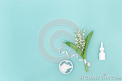 Allergy concept. Nose spray, tablets against allergies to pollen of flowering plants -antihistamine drug, spring blossom Stock Photo