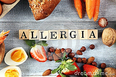 Allergy food concept. Allergy food as almonds, milk, cheese, strawberry, seeds, eggs, peanuts and .crustaceans or shrimps with Stock Photo