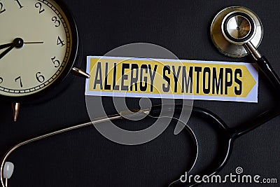 Allergy Symtomps on the paper with Healthcare Concept Inspiration. alarm clock, Black stethoscope. Stock Photo