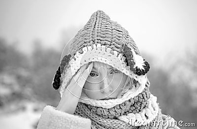 Allergy winter season. Woman having headache on snow background. Stock Photo