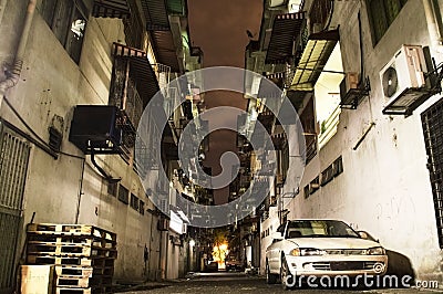 Alley in the night in Kuala Lumpur poor suburb Stock Photo