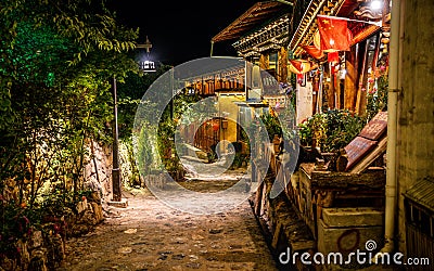 Alley view of Dukezong Tibetan old town at night in Shangri-La Yunnan China Editorial Stock Photo