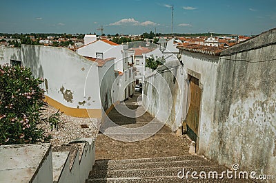 Alleyway with steps on slope at Estremoz Stock Photo