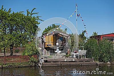 Allotment gardens at the old trave, lubeck, germany Editorial Stock Photo