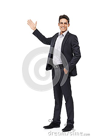Allow me to introduce your copyspace. Full length portrait of a handsome young businessman presenting your copyspace. Stock Photo