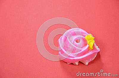 Allure colorful Thai candy with rose shape on red background Stock Photo