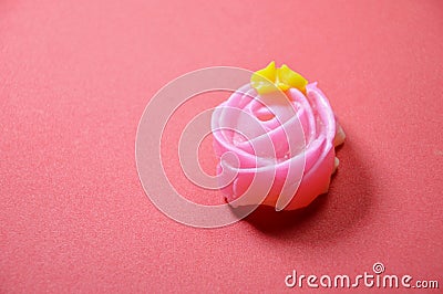 Allure colorful Thai candy with rose shape on red background Stock Photo