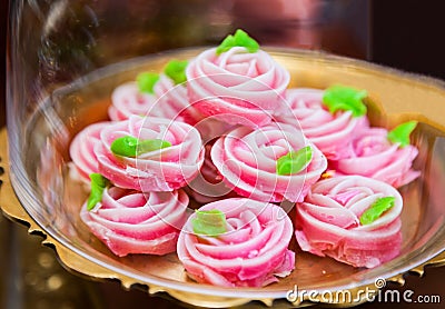 Allure, Traditional Asian Thai colorful pink candy sweet dessert made from flour, sugar and coconut milk. Outer sugar crust made Stock Photo
