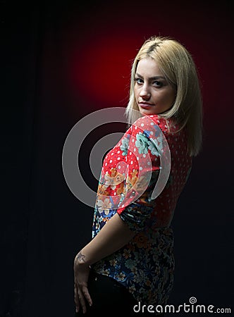 Alluring young blonde posing in studio Stock Photo
