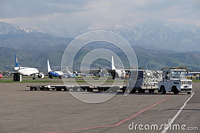 Almaty / Kazakhstan - 04.18.2020 : Airport staff and medics unload humanitarian cargo Turkish Cargo Editorial Stock Photo