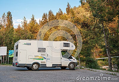 Almaty, Kazakhstan - August 18, 2023: A Ford Transit motorhome sits in a parking lot in the mountains Editorial Stock Photo