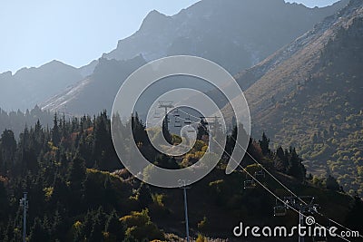 Almaty / Kazakhstan - 09.23.2020 : Cable car among the mountains and hills of Shymbulak Editorial Stock Photo