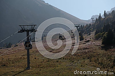Almaty / Kazakhstan - 09.23.2020 : Cable car among the mountains and hills of Shymbulak Editorial Stock Photo