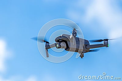 Almaty, Kazakhstan - June 13, 2021: The DJI MAVIC AIR 2S drone in flight at altitude Stock Photo