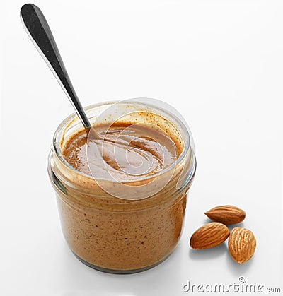 Almond butter in jar Stock Photo