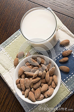 Almond Milk with almonds on table - Overhead Stock Photo