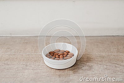 Almond nuts with salt health food or ingredient on a wooden background Stock Photo