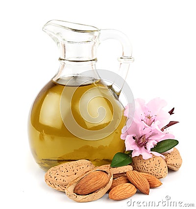 Almond oil and almond nuts Stock Photo