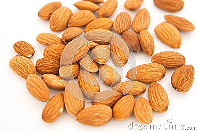 Almond superfood on white background. Concept of healthy life. Close up. Nuts fill the whole frame Stock Photo