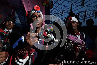 Almora, Uttrakhand - February 27 2021 : old aged dancers dancing in an indian wedding wearing colorful clothes Editorial Stock Photo