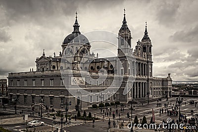 Almudena Cathedral, Madrid. Spain, Europe Cloudy sky in spring. Editorial Stock Photo