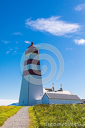 Alnes lighthouse at clear sumer sky at Godoy island near Alesund, Norway Stock Photo