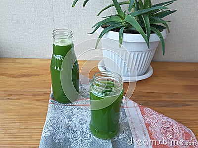 Aloe leaves juice on the table Stock Photo