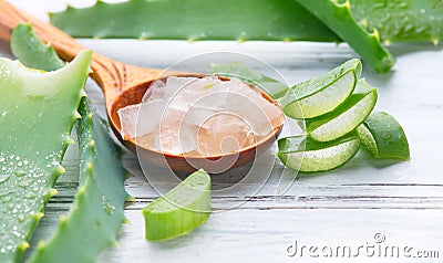 Aloe Vera gel closeup. Sliced Aloevera natural organic renewal cosmetics, alternative medicine. Organic skincare concept Stock Photo