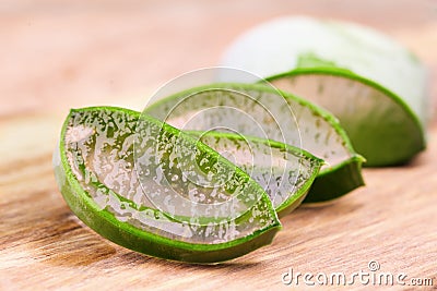 Aloe Vera slices closeup. Slice of Aloevera plant leaf, gel, natural organic renewal cosmetics Stock Photo