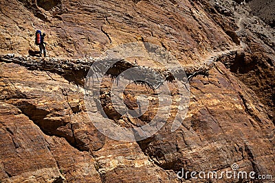 Alone mountaineer, going dangerous path Stock Photo