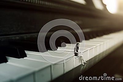 Alone on the piano Stock Photo