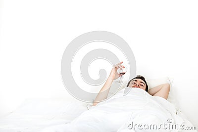 Alone young man in bed Stock Photo