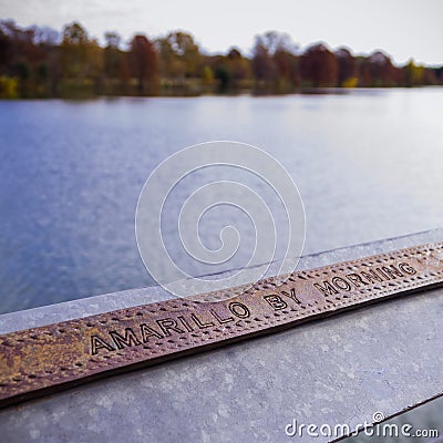 Engraved Railing on Lady Bird Lake During Fall Editorial Stock Photo