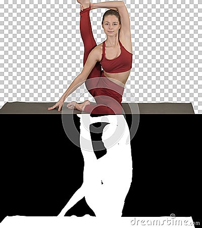 Sporty yogi girl doing fitness practice, stretches, yoga asana P Stock Photo