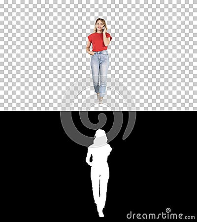 Woman in casual walking and talking on the phone, Alpha Channel Stock Photo