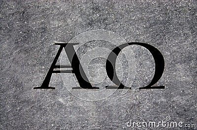 Alpha and Omega in stone Stock Photo