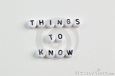 Alphabet beads with text THINGS TO KNOW Stock Photo
