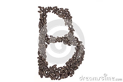 Alphabet from black sunflower seeds Stock Photo