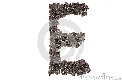 Alphabet from black sunflower seeds Stock Photo