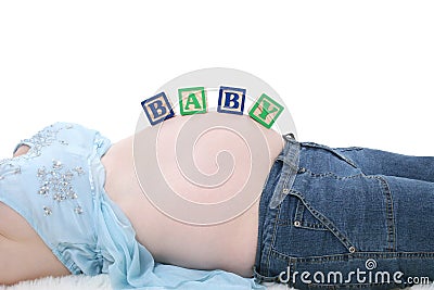 Alphabet Blocks Spell Baby Across Expecting Mom Belly Stock Photo