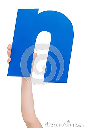 Alphabet letter in child hand Stock Photo