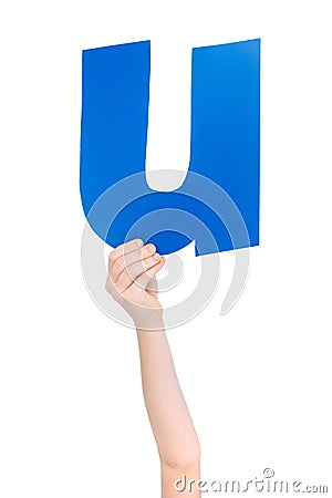 Alphabet letter in child hand Stock Photo