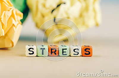 Alphabet letter dice text on desk, spelling STRESS Stock Photo